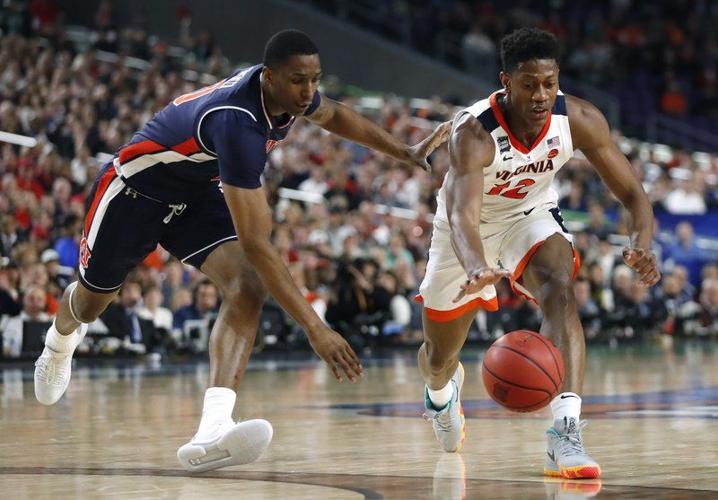 NCAA MEN'S BASKETBALL Virginia, Texas Tech clash with contrasting