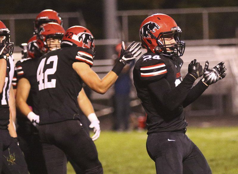 PREP FOOTBALL NorthWood makes history in sectional opener Local Sports