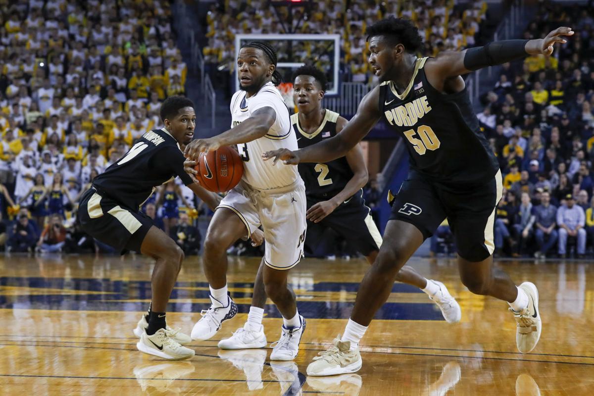 Purdue Basketball Michigan Survives Double Overtime Against