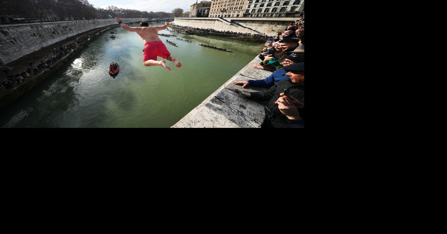 APTOPIX Italy New Year's Dive