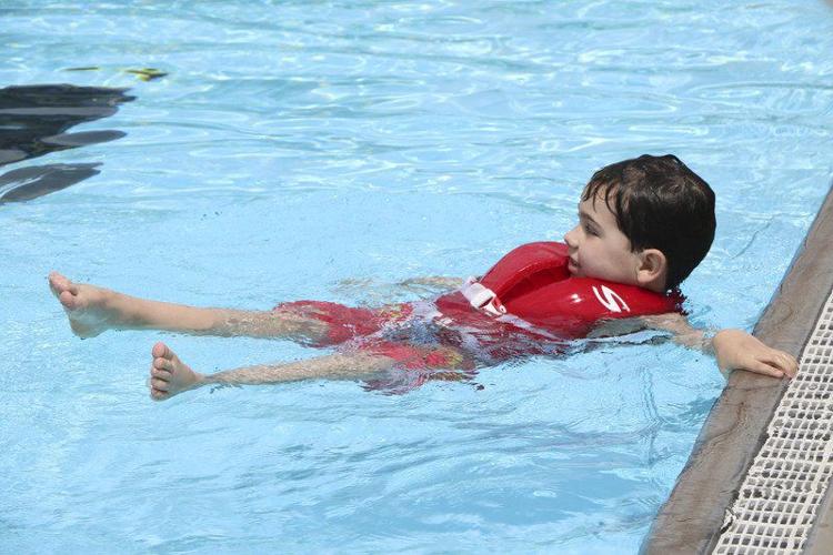 Families kick off summer with pool, park time Local News