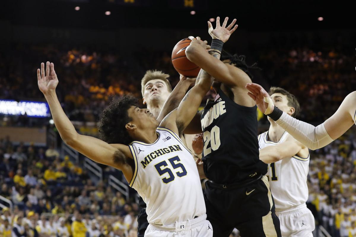 Purdue Basketball Michigan Survives Double Overtime Against