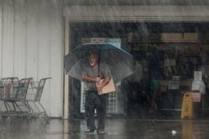 Lala is again a tropical storm, sending drenching rain and winds across the Hawaiian islands