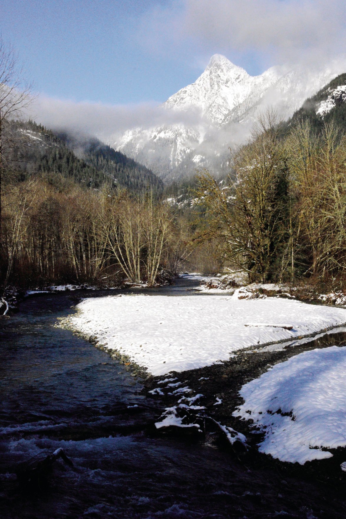 Diobsud Creek sparkles with recent snowcapped peaks
