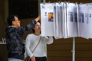 Hong Kong voter turnout rate edges up despite public anger over deadly fire