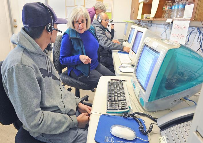 Spanishspeaking volunteers help with Christmas Fund Local News
