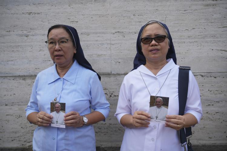 The Latest Pope Francis lies in state ahead of his funeral, set for