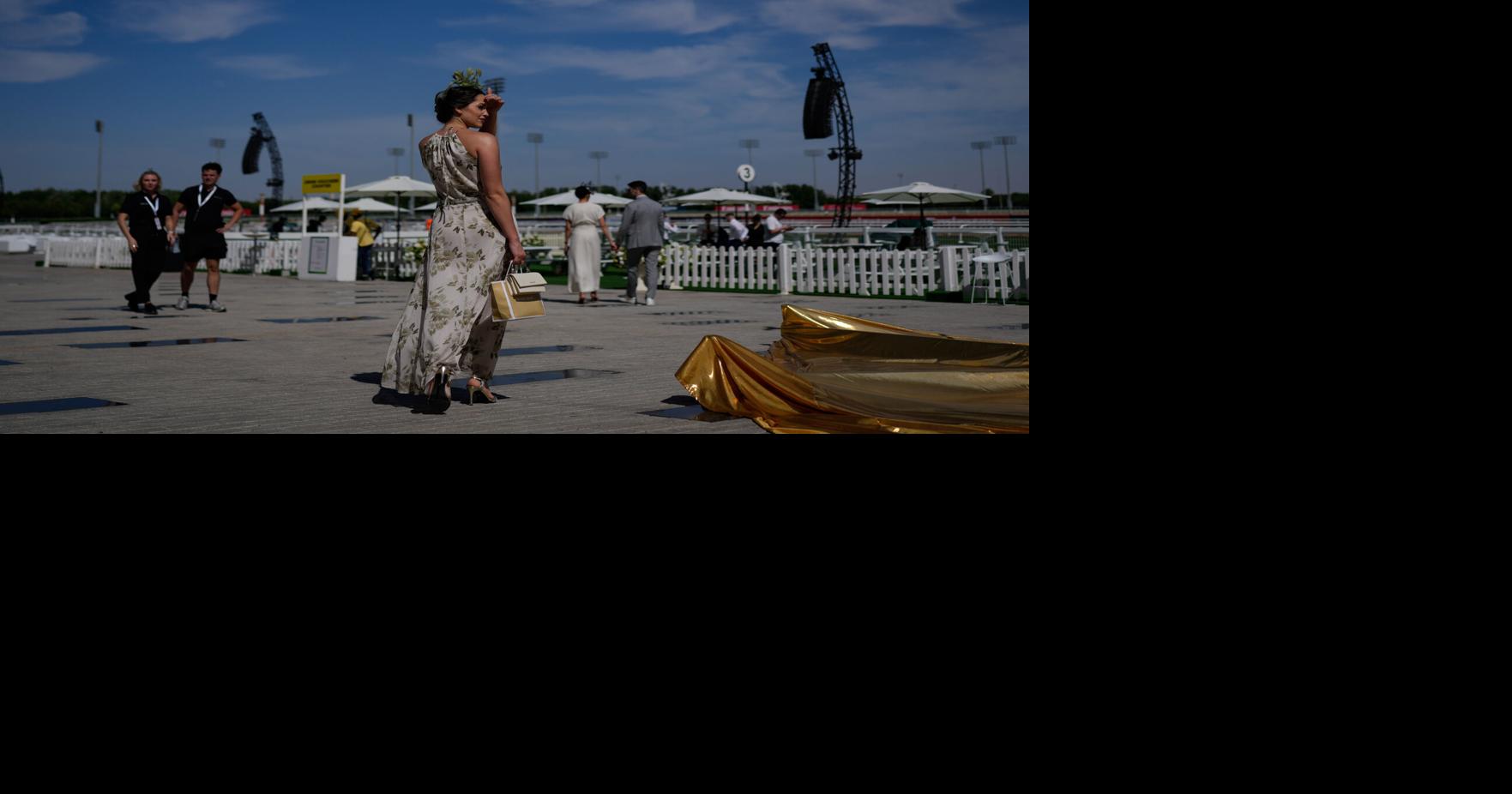 Photos show glamour at the Dubai World Cup horse race but thinner crowds due to Iran war