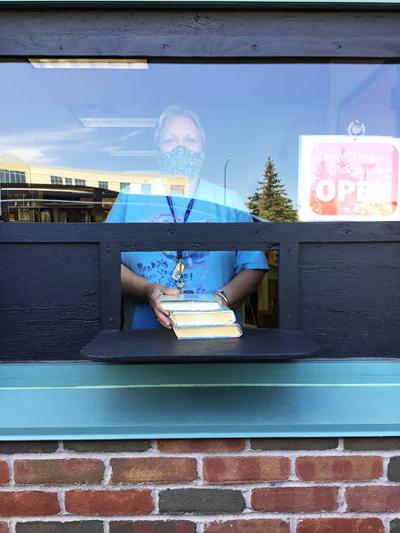 Library finds success in drive-thru services | COVID-19 | grandrapidsmn.com