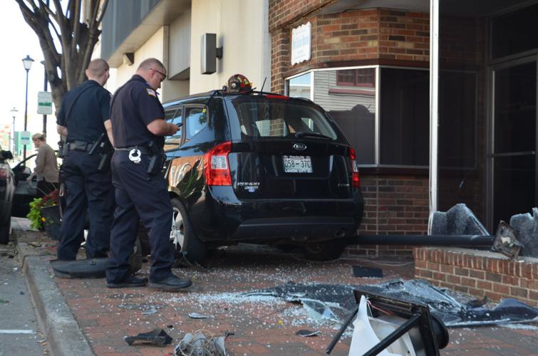 Vehicle Careens Into Downtown Light Pole Local News