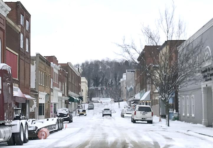 Wintry Weather Deposits Snow, Causes Slick Roads Local News