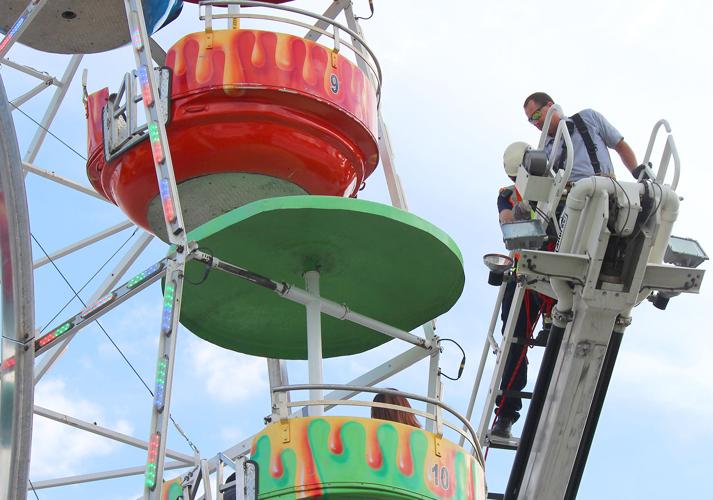 Firefighters Assist Ferris Wheel Riders