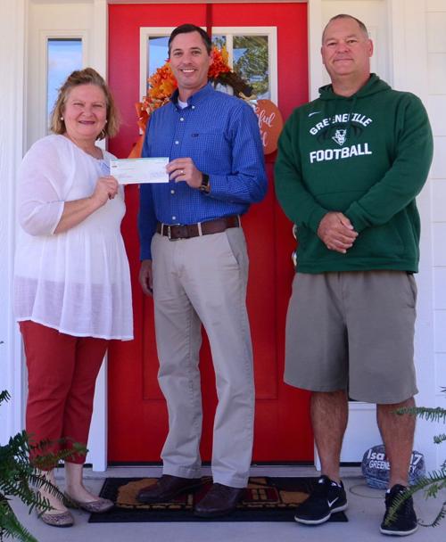 GMS Football Donates To Isaiah House