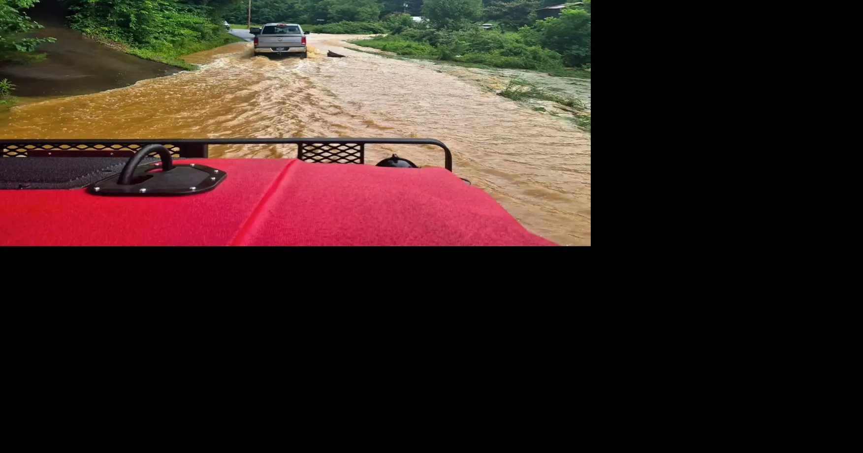Flood shelter opens as torrential rain causes damage, rescues