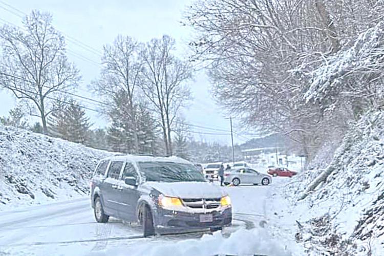 Wintry Weather Deposits Snow, Causes Slick Roads Local News