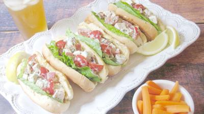 This Chicken Salad Is Served In A Hot Dog Bun Accent