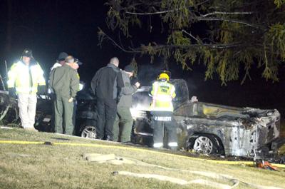 fiery crash greenevillesun crashed remains veered officials gather pickup evening wednesday truck around road off
