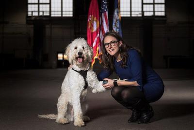 How do we know service dogs help veterans with PTSD?