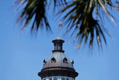 Statehouse-framed-by-palm-fronds-2048x1382.jpg