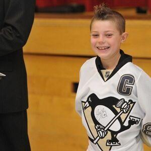 Signed Crosby jersey presented to Elora student struck by car