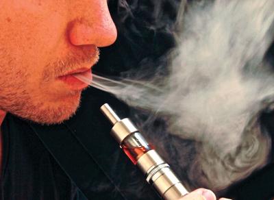 School board tightens rules on smoking School board tightens rules on smoking