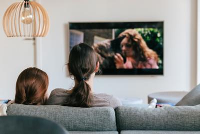 Woman and child watching TV (copy)