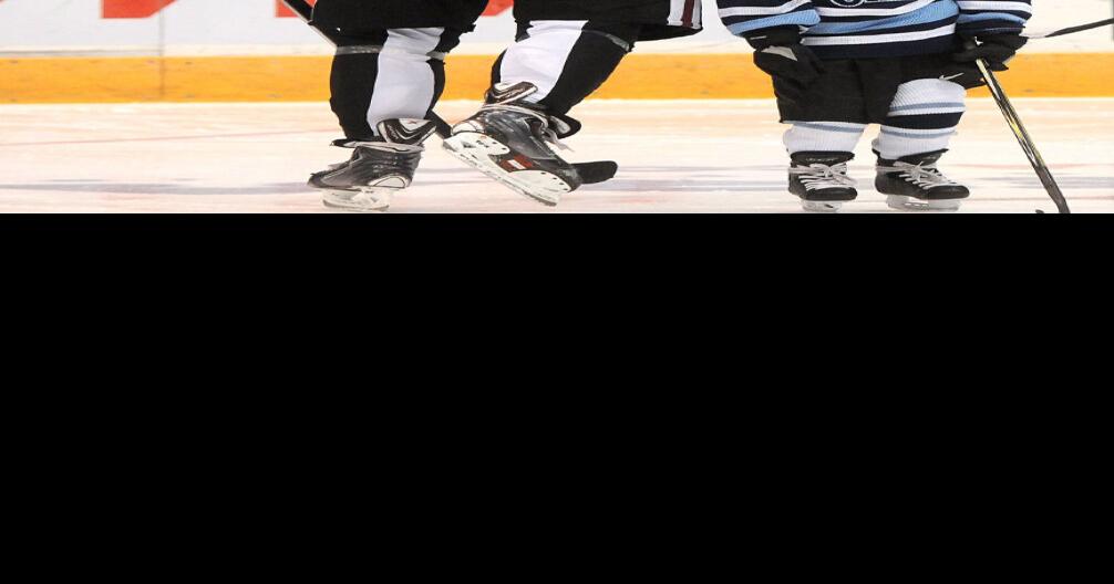Guelph Storm skate with Giants