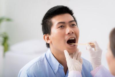 COVID-19 new variant sore throat