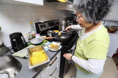 Htoo Htoo Than cooks traditional Burmese food in her East York home