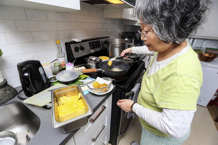 Htoo Htoo Than cooks traditional Burmese food in her East York home