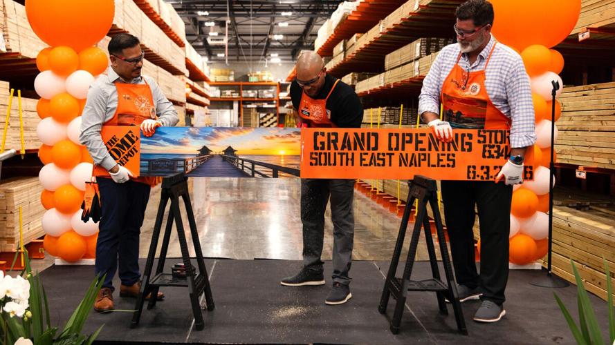 Home Depot marks opening with board-cutting