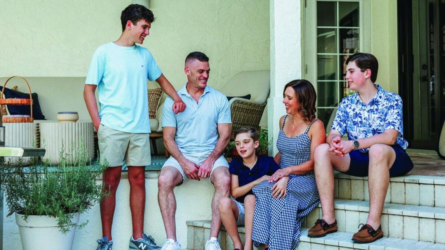 The Mitchell family enjoys a summer cookout