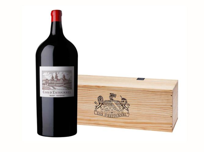 A world-class wine collection and artisan-crafted tasting table are offered as a live auction lot at the Naples Winter Wine Festival on Jan. 31, 2026, featuring rare large-format and vintage bottles from top global estates, paired with handblown glassware and a custom high-top table for an elevated tasting experience.
