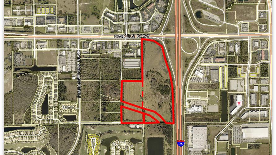 Aerial view of 60-acre Daniels Parkway land sale
