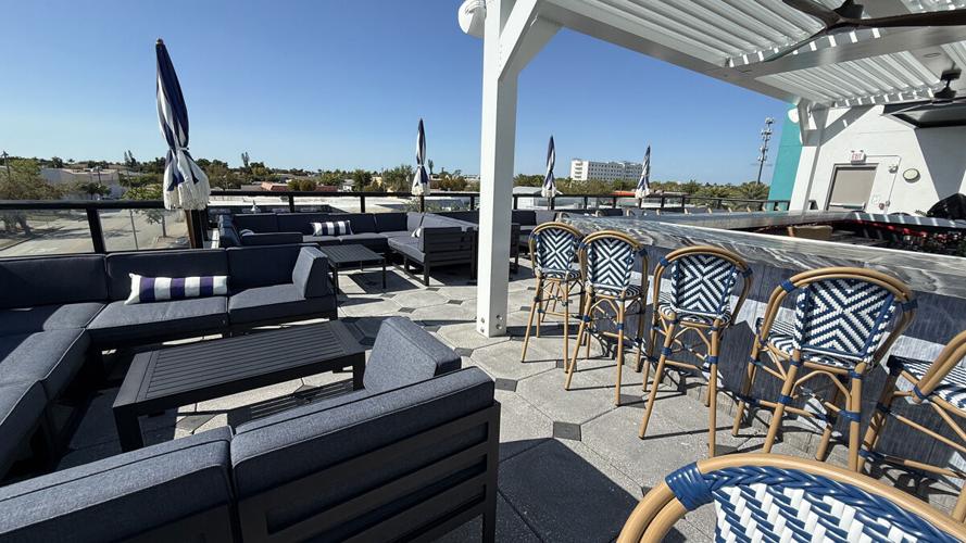 Aqua Cape Coral features rooftop bar and seating