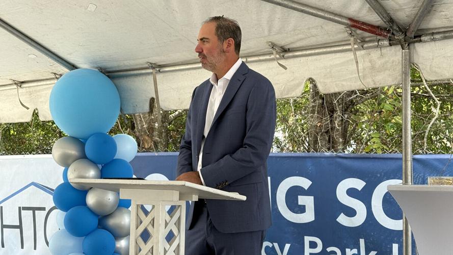 Housing Trust Group executive speaks at event