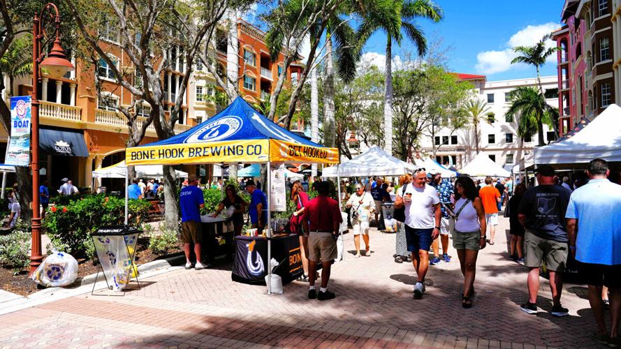 Brewers serve samples at Naples Craft Beer Fest