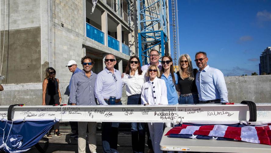 Kolter Urban celebrates Estero luxury tower topping out