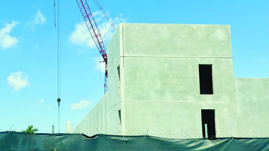 Parking garage rises at Lely Resort apartments site
