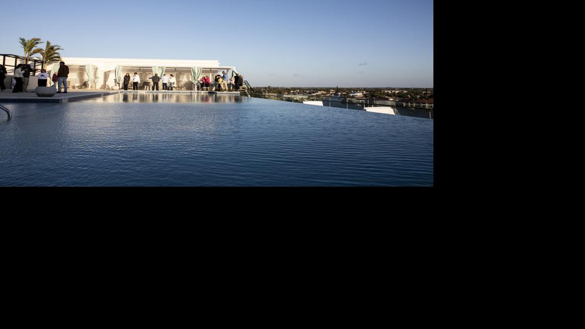 Guests tour rooftop amenities at Bimini Square