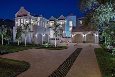 306 Spring Line Dr Naples FL-large-025-039-Front2Night-1499x1000-72dpi.jpg