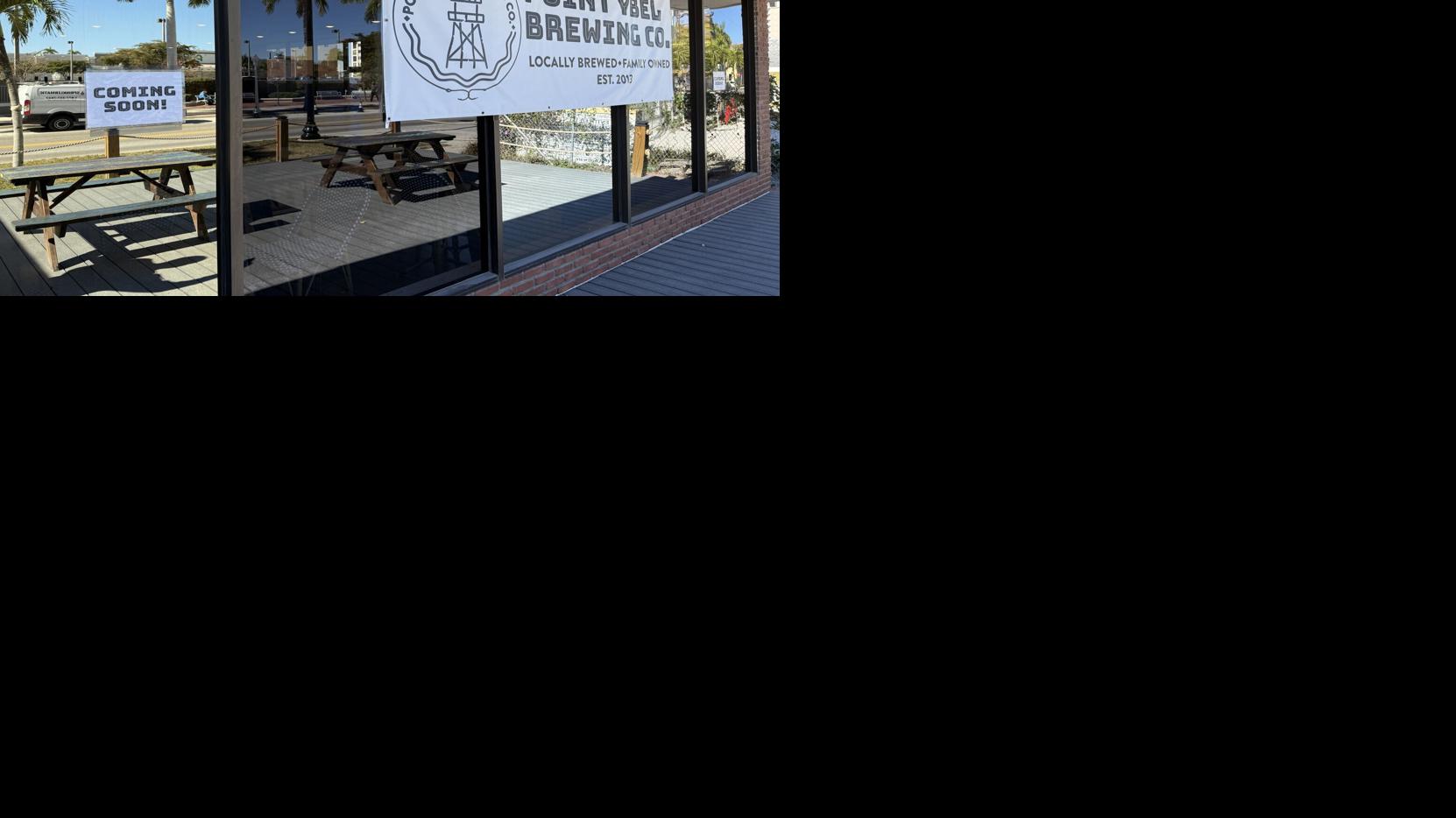 A banner for Point Ybel Brewing Co. hangs at the site of the brewery’s future downtown Fort Myers brewpub at 2180 W. First St. The 2,300-square-foot location is expected to open in March.