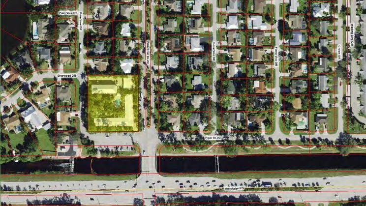 Aerial shows Fairways Inn site in North Naples