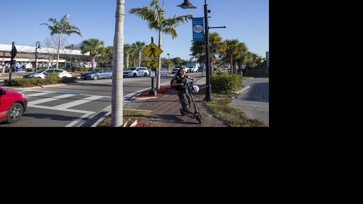 Pedestrians, scooters share crowded streets