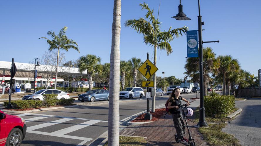 Pedestrians, scooters share crowded streets