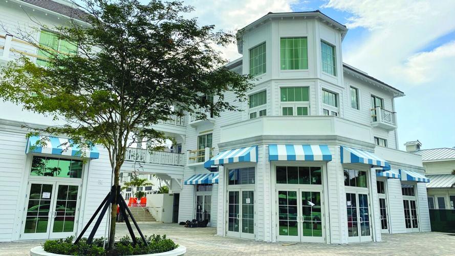Retail courtyard anchors Olde Naples Hotel design
