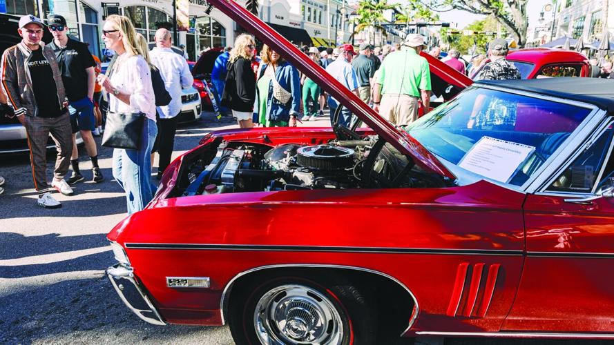 Classic cars line Fifth Avenue during Cars on 5th