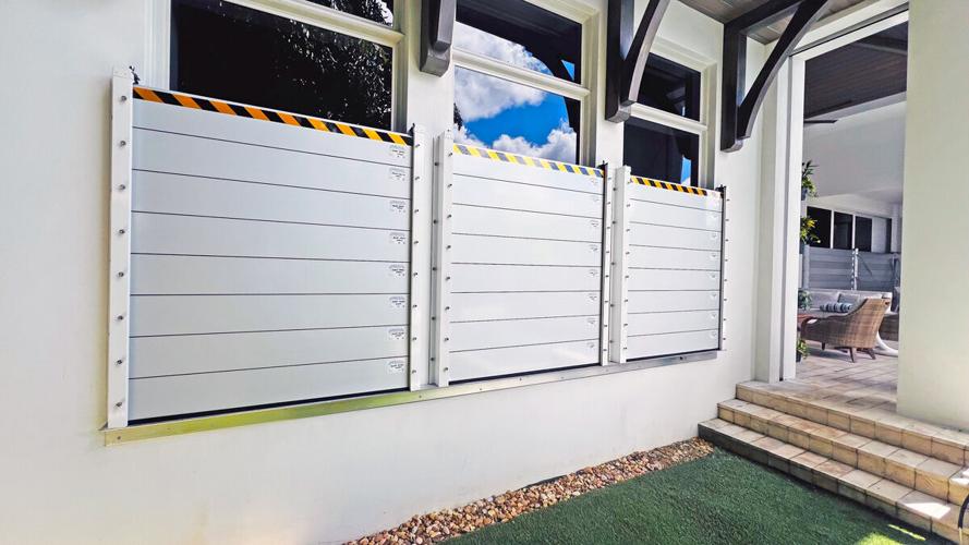 Hammerhead panels cover Naples window shutters