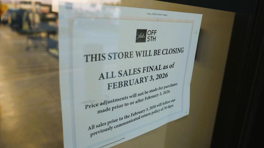 Store closing notice posted at Naples Saks Off 5th