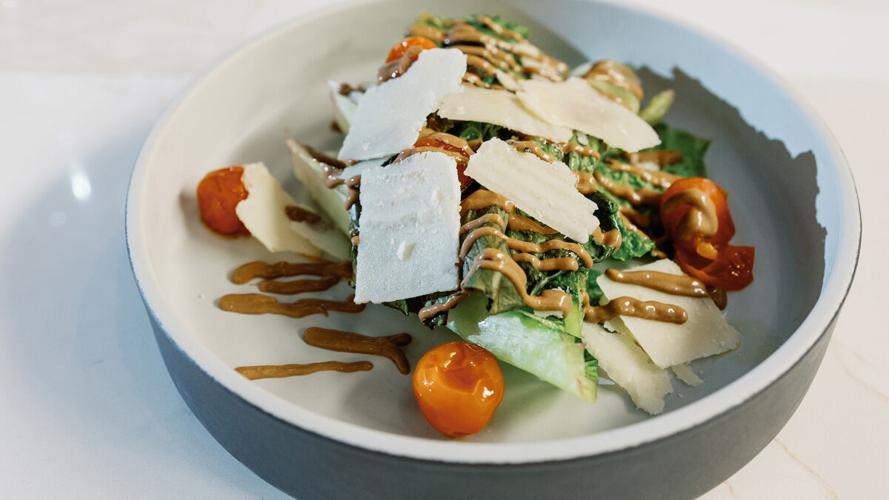 Charred romaine with black garlic dressing at Vybe